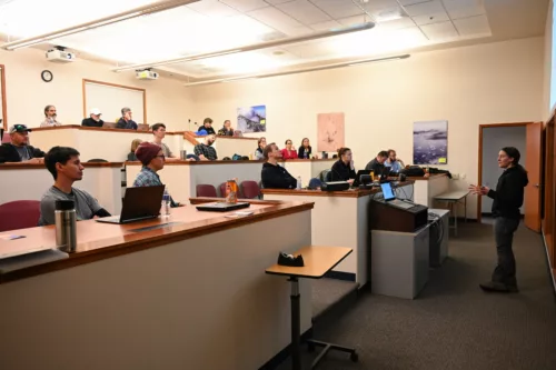 staff listening to presenter in a classroom